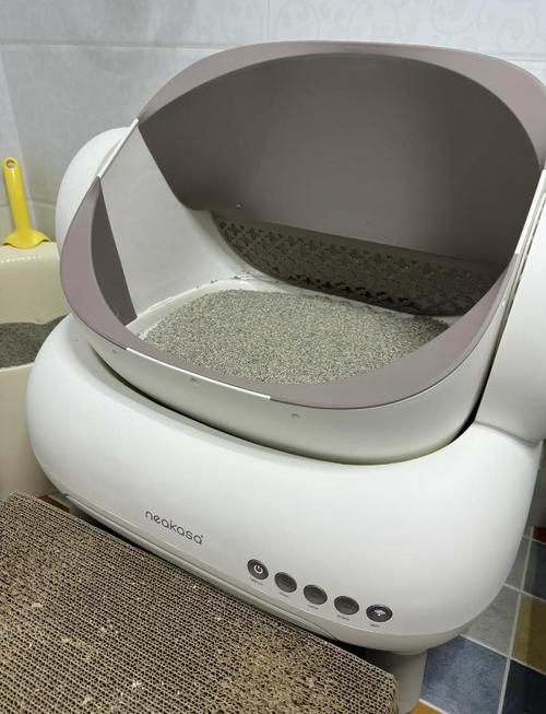 自动猫砂盆好还是手动好_自动清理省心，但贵且需维护