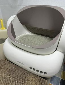 自动猫砂盆好还是手动好_自动清理省心，但贵且需维护